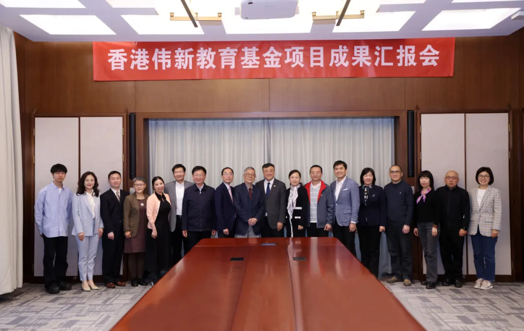 A group photo of the participants at the project result report meeting.